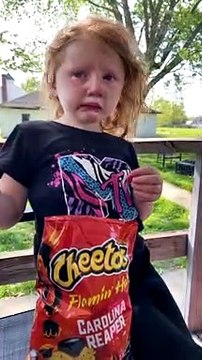 Grimacing Girl Says She Likes Spicy Cheetos