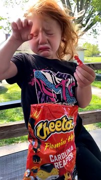 Grimacing Girl Says She Likes Spicy Cheetos