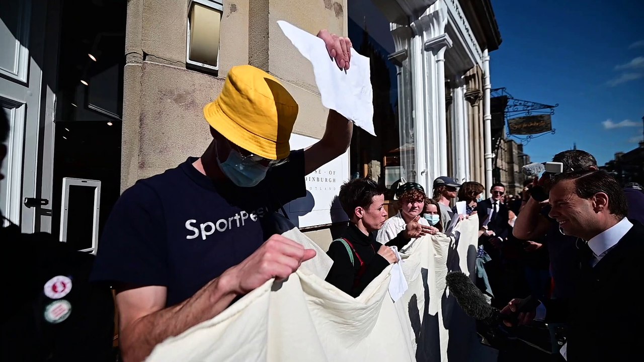 Freedom of speech protesters outside St Giles Cathedral where Queen Elizabeth  II  lies at rest