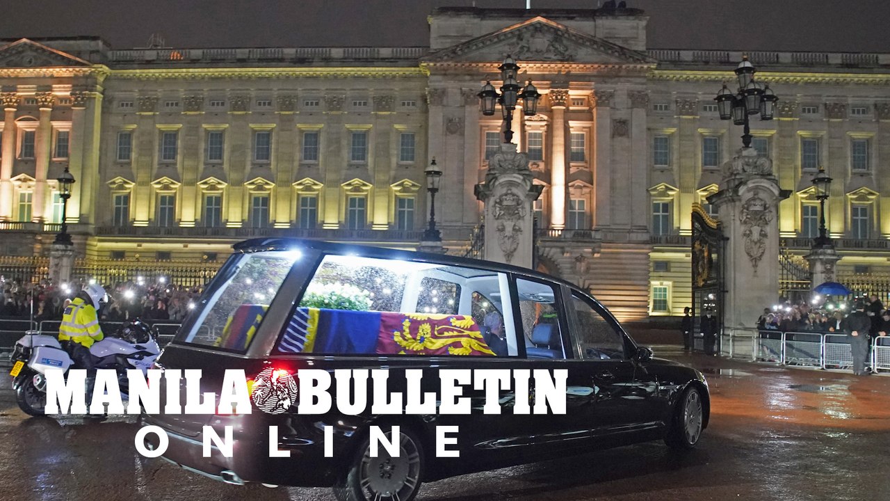 Under leaden skies, Queen Elizabeth II’s coffin returns to London
