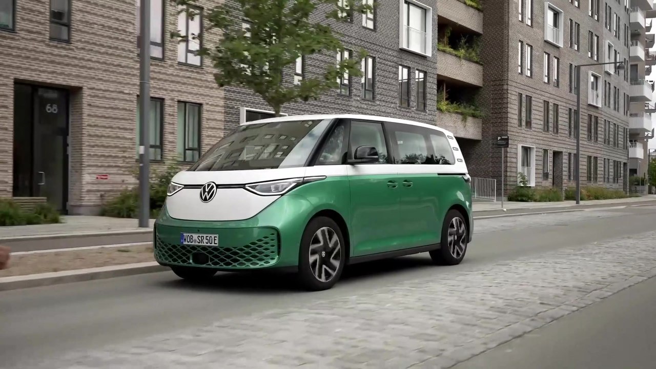 Volkswagen ID. Buzz People in Candy White and Bay Leaf Green Driving