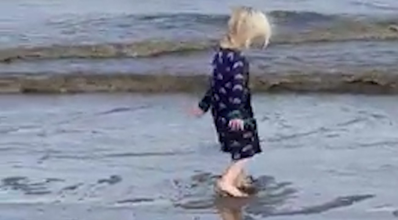 Viral video of family 'stepping in sewage on beach' debunked as 'natural sea algal'