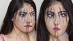 Artist paints her hand on face and face on hand as part of a MIND-BOGGLING look