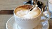 stock-footage-sugar-is-poured-into-a-cup-of-cappuccino-coffee-close-up-of-cappuccino-coffee-cup (1)