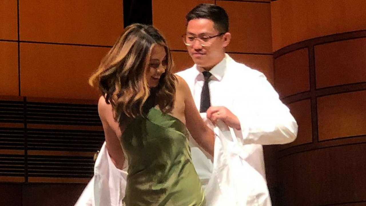 Medical Student Receives White Coat From Her Older Brother In Touching Ceremony
