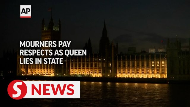 Mourners pay respects as queen lies in state