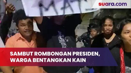 Sambut Rombongan Presiden, Warga Bentangkan Kain Bertuliskan 'Jokowi Sampai Mati'