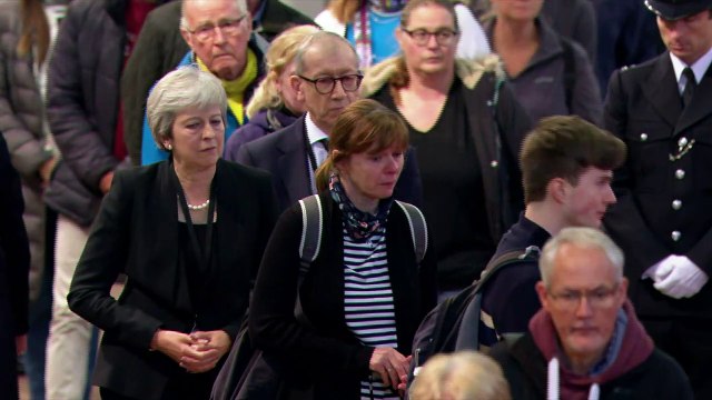 Theresa May joins public paying respects to Queen