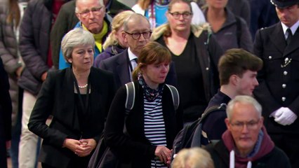 Theresa May joins public paying respects to Queen