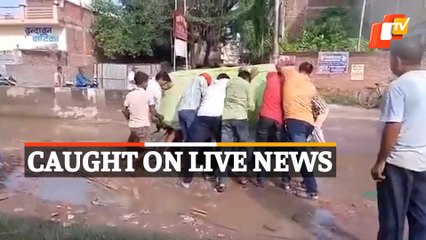WATCH | Pothole Mishap Caught On Camera During Live News