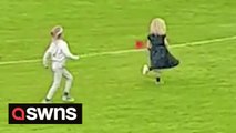 Adorable video shows a six-year-old girl who ran past the finish line of a children’s race – to complete a full lap of the track