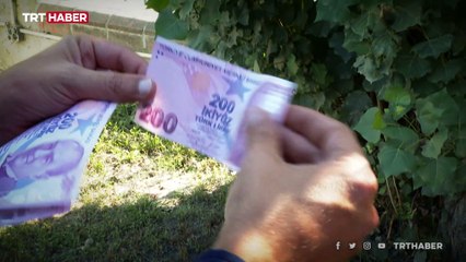 Satıcının dikkati kalpazanların oyununu bozdu