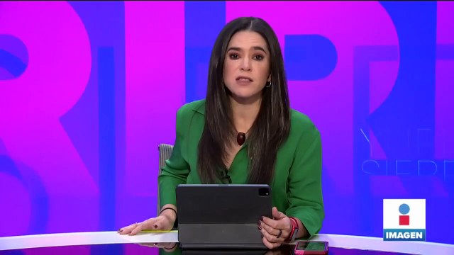 Activistas escalan la Estela de Luz para colocar manta en contra de la militarización