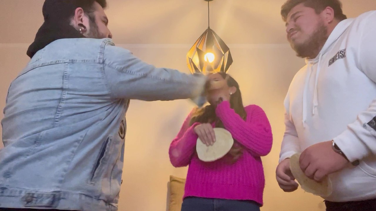 Goofy friends go into a laughing frenzy while playing the tortilla slap game