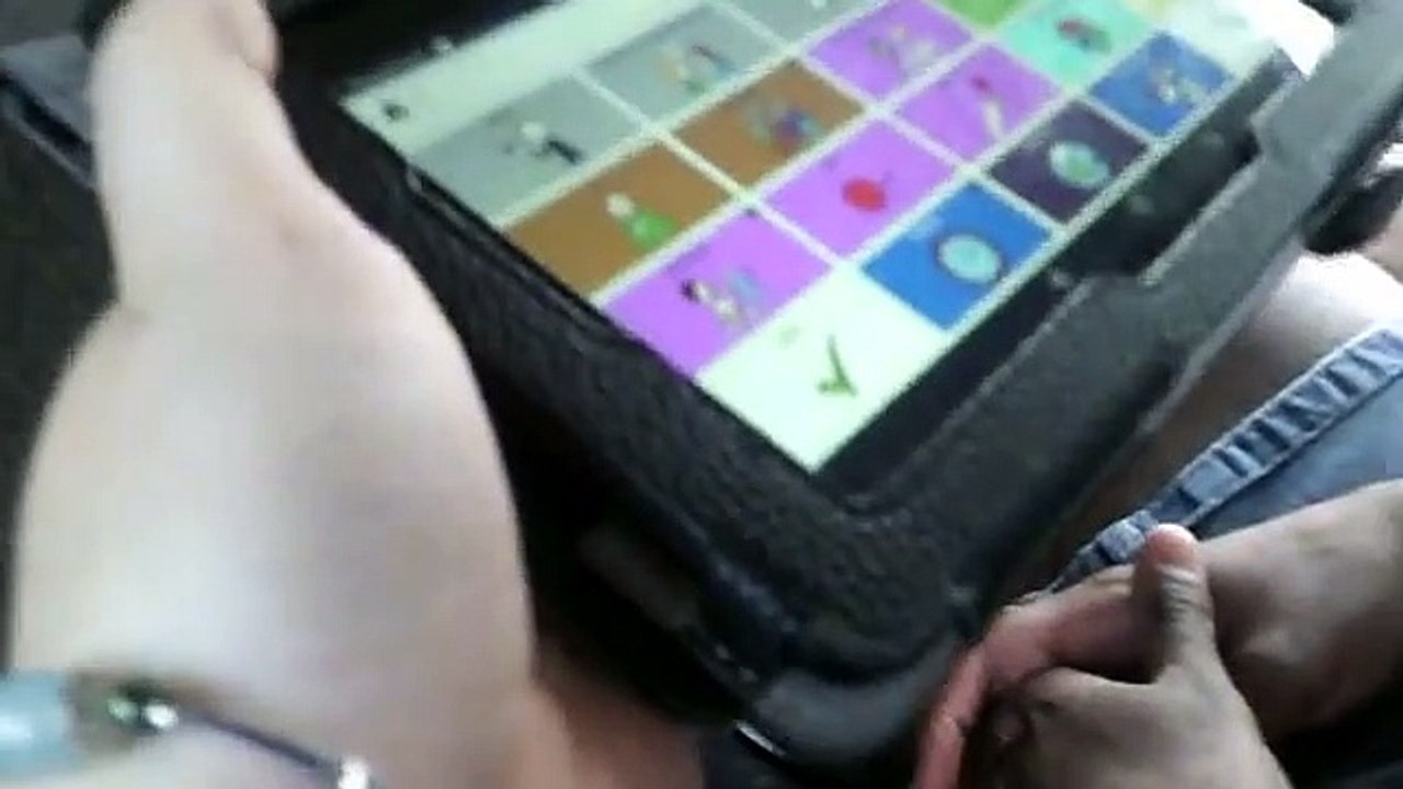 Adult with autism  answering questions using coughdrop AAC