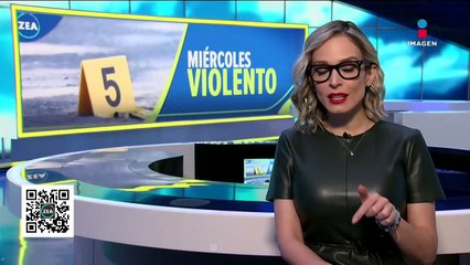 Integrantes del colectivo "Hasta encontrarte" escalan la Estela de Luz para colocar manta