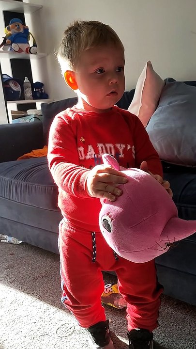Kiddo is Oblivious to Big Spider on Stuffed Toy