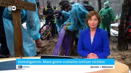 Izium mass grave shows signs of torture