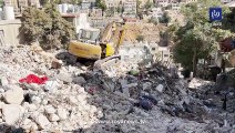 مشاهد من إزالة أنقاض بناية اللويبدة بعد انتهاء عمليات البحث والإنقاذ
