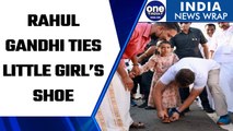 Bharat Jodo Yatra: Rahul Gandhi ties little girl’s shoe, video goes viral | Oneindia News *News