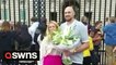 Tyson Fury pays his respects to the Queen by laying flowers outside Buckingham Palace