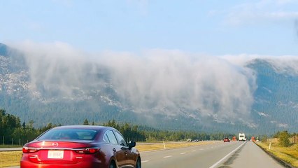 A Waterfall of Clouds in the Mountains