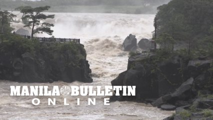 Japan: Swollen river and debris on roads after Typhoon Nanmadol