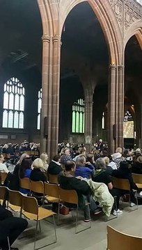 Mourners in Manchester Cathedral watching Queen Elizabeth II's funeral