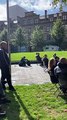 Mourners in Cathedral Gardens, Manchester watching Queen Elizabeth II's funeral