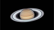 Saturn left with a tilt after its own moon crashed into it
