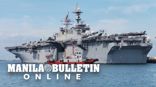 USS Tripoli docks in Manila for a port call