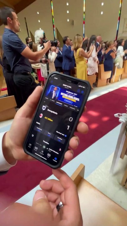 Groom Given Game Update During Wedding