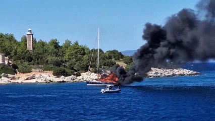 Yacht Burns on the Water