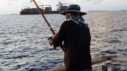 Fishing on the beach of Male, the capital of the Maldives.