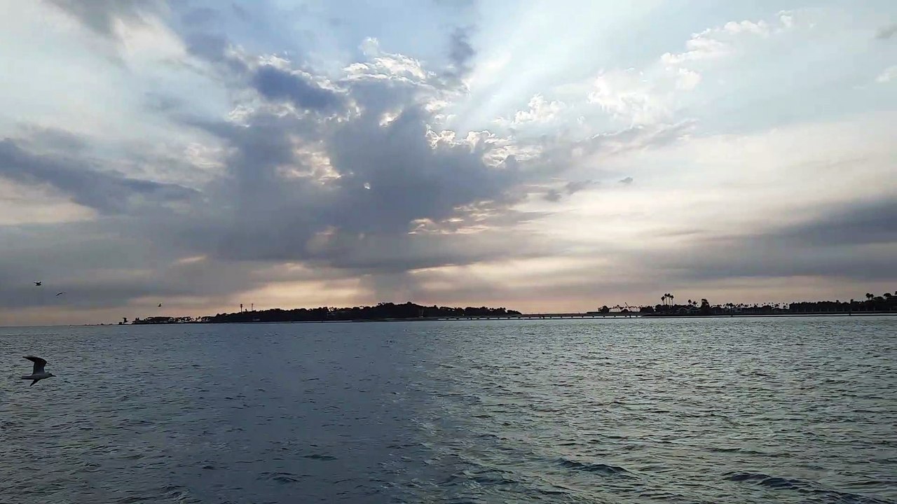 The sun setting on the Jeddah Corniche and the beautiful changing color of the sky.