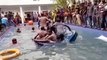 Sri Lankan protesters cool down their anger by enjoying in president's pool