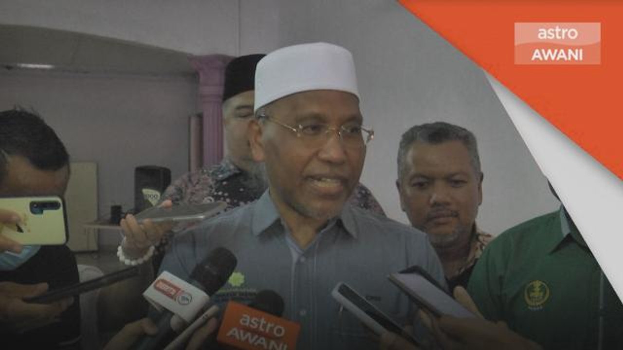 Berpakaian Ihram | Wanita berpakaian ihram telah pulang ke tanah air