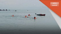 Enam Lemas | Ketika mandi di pantai Tanjung Balau