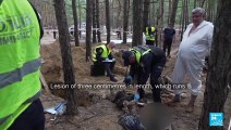 Ukraine graves site: Investigators continue exhuming bodies outside Izium