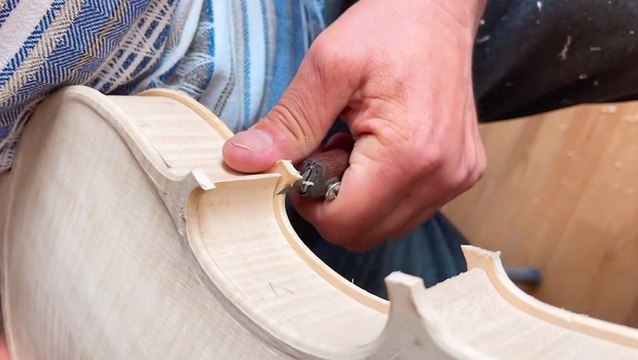 Hand-carving violins and cellos