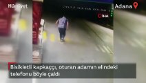 Bisikletli kapkaççı, oturan adamın elindeki telefonu böyle çaldı