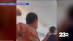 Flight attendant is attacked during a flight, assailant is detained, arrested