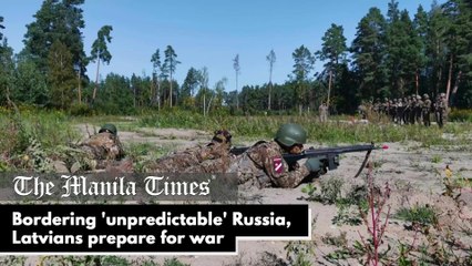 Bordering 'unpredictable' Russia, Latvians prepare for war