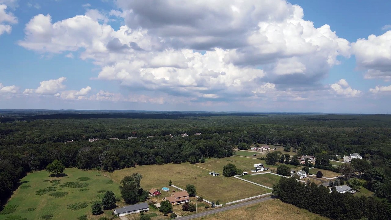 DJI Mavic Air 2 flies over a farm filed in Iowa. Received 100M views on YT.
