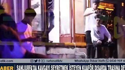 Suriyelilerin kavgasını izlemek isteyen berber, müşteriyi sokakta tıraş etti