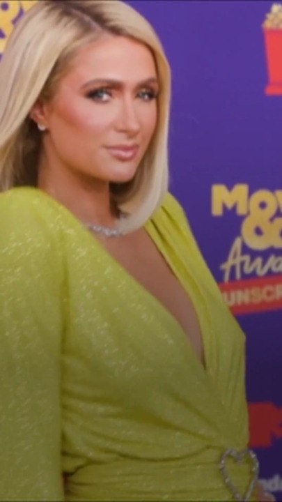 Paris Hilton Looked Like an '80s Bride in a Hot Pink Minidress on the Versace Runway