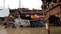 Typhoon Noru floods busy Philippine streets, causes damage