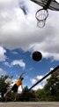Man Shoots Multiple Hoops While Balancing on Slackline
