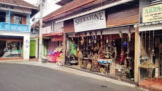 Some of India's best antique shops at Jew Town, Mattancherry area, Kochi, Thoppumpady Harbour Bridge