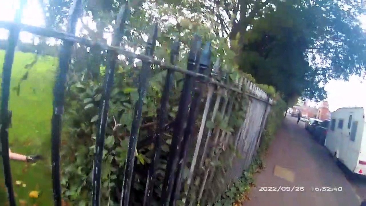 UK police officer branded 'Mr Tumble' after hilariously falling off a fence to reach a 'suspicious' package